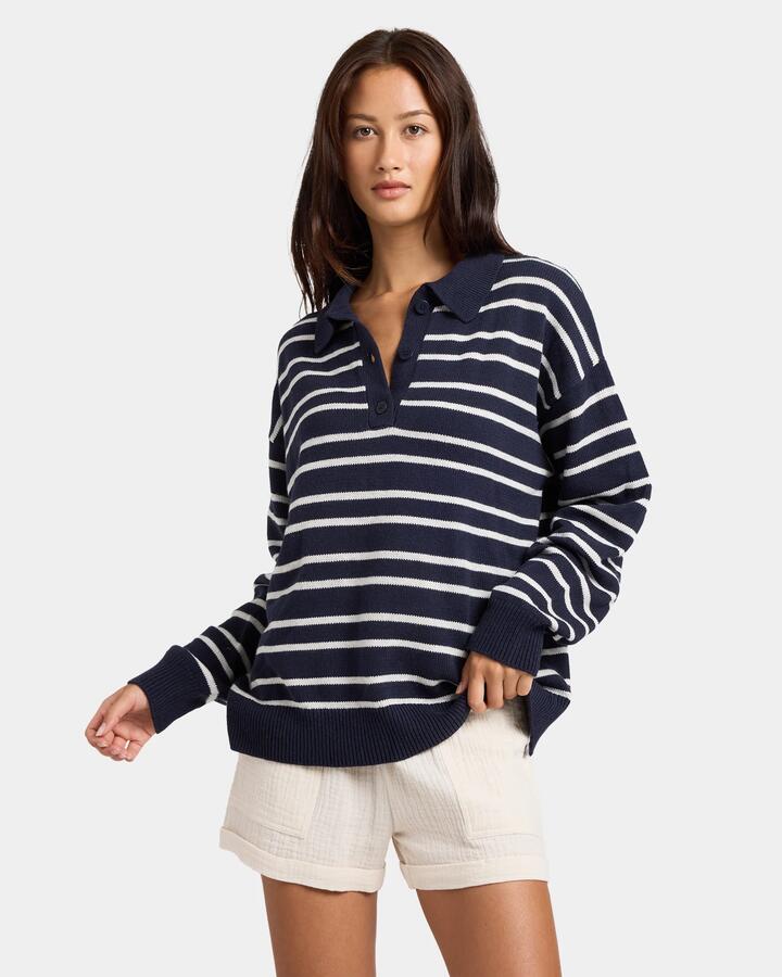Image of a model wearing Outerwear. Product name - Nunui Womens Streetwise Sweatshirt Navy in Navy colour by brand - Nunui
