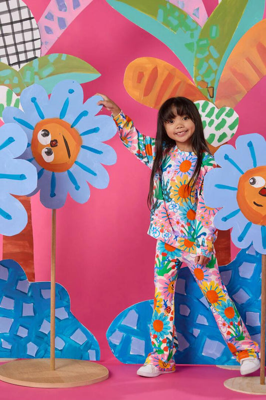 Image of a model wearing Pants. Productname: Hyper Floral Kids Legging in Multi colour by brand - Gorman