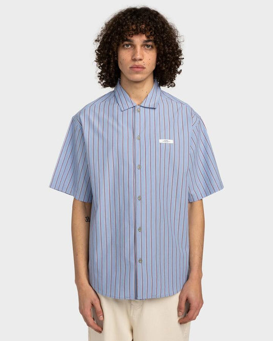 Image of a model wearing Tops. Productname: Element Mens Idle Short Sleeve Shirt Stripe Blue/Pomegranate - in Stripe Blue/Pomegranate colour by brand - Element