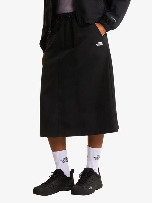 Image of a model wearing Skirts. Productname: The North Face Women's TNF Easy Wind Skirt in Tnf Black colour by brand - The North Face