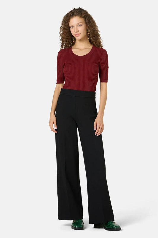 Image of a model wearing Pants. Productname: Theodora Ponte Pant in Black colour by brand - Gorman