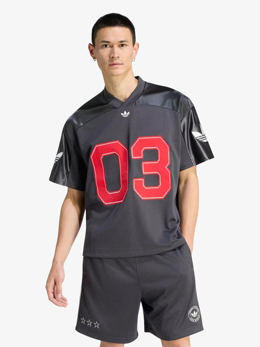 Image of a model wearing Tops. Productname: Adidas Originals Soccer Jersey in Utility Black colour by brand - Adidas