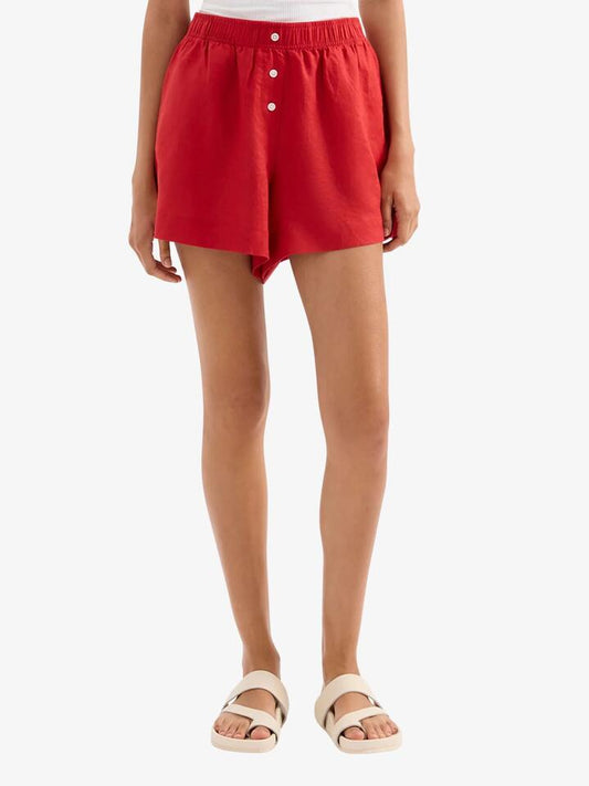 Image of a model wearing Shorts. Productname: Nude Lucy Lounge Linen Shorts in Vermillion colour by brand - Nude Lucy