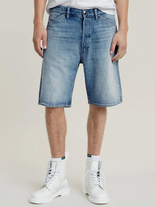 Image of a model wearing Shorts. Productname: G-Star Denim Loose Shorts in Sun Faded Blue Donau colour by brand - G-Star