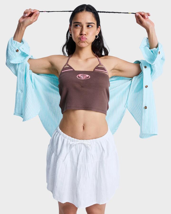 Image of a model wearing Skirts. Productname: roxy Womens Dreamy Mini Skirt Coconut Milk - in Coconut Milk colour by brand - Roxy