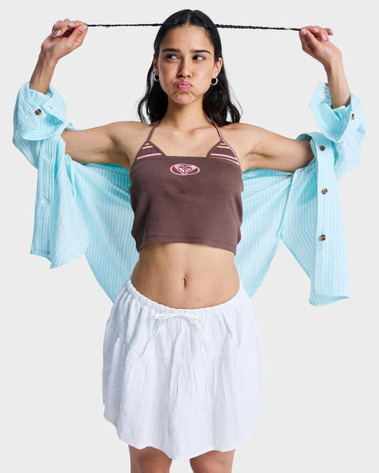 Image of a model wearing Skirts. Productname: roxy Womens Dreamy Mini Skirt Coconut Milk - in Coconut Milk colour by brand - Roxy
