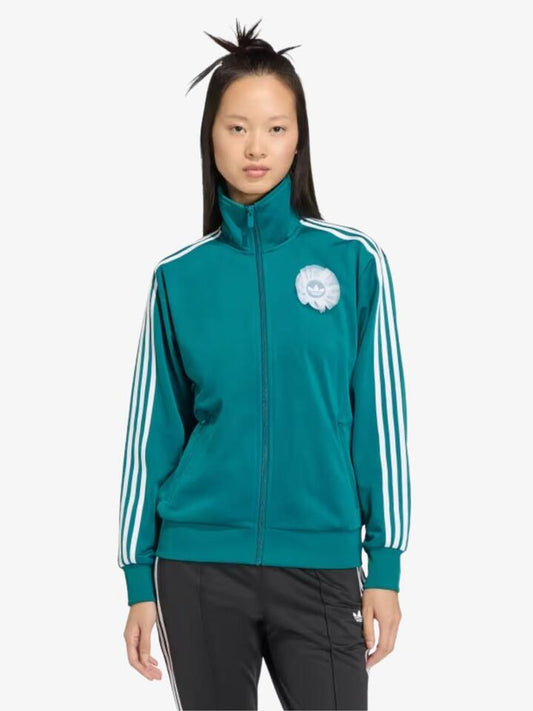 Image of a model wearing Tops. Productname: Adidas Lace Branding Firebird Track Top in Legacy Teal colour by brand - Adidas