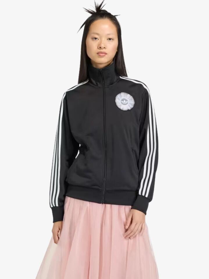 Image of a model wearing Tops. Productname: Adidas Lace Branding Firebird Track Top in Black colour by brand - Adidas