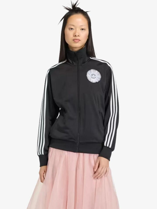 Image of a model wearing Tops. Productname: Adidas Lace Branding Firebird Track Top in Black colour by brand - Adidas