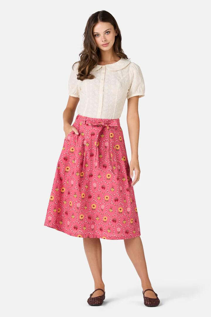 Image of a model wearing Skirts. Productname: Honey Bee Hive Skirt in Pink colour by brand - Princess Highway