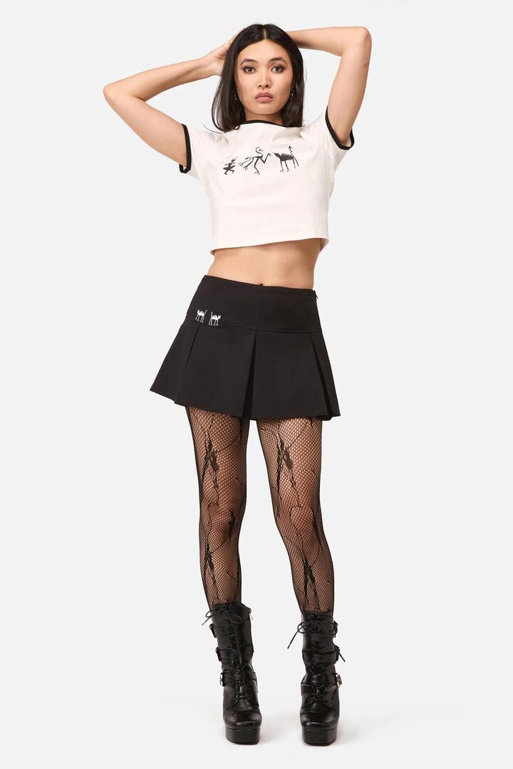 Image of a model wearing Skirts. Productname: Demons Goth Mini Skort in Black colour by brand - Dangerfield