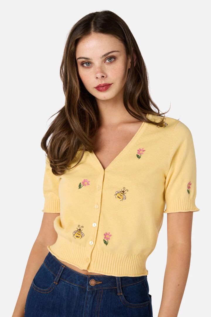 Image of a model wearing Outerwear. Productname: Honey Embroidered Cardigan in Lemon colour by brand - Princess Highway