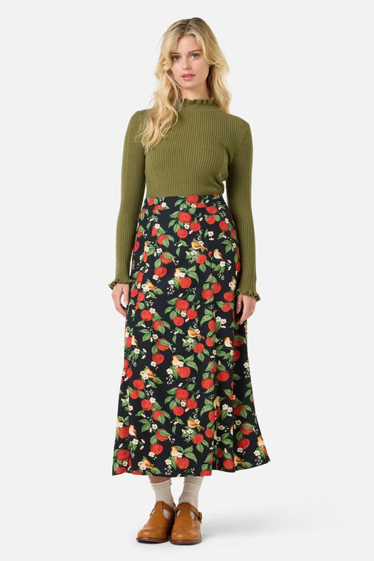 Image of a model wearing Skirts. Productname: Apple Blossom Midi Skirt in Navy colour by brand - Princess Highway