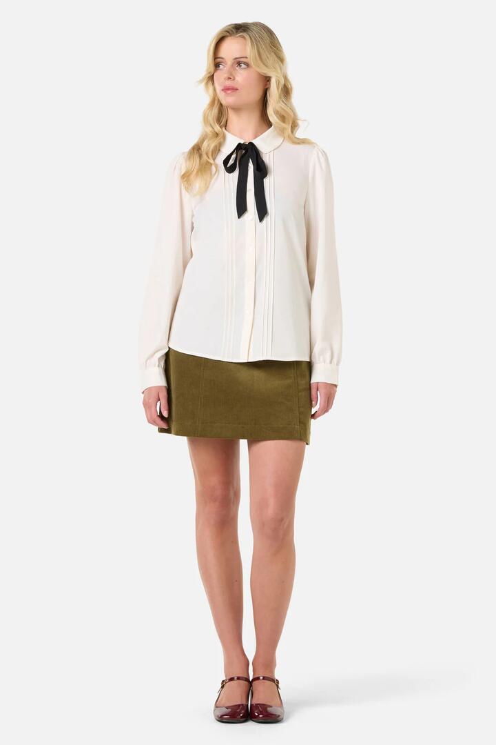 Image of a model wearing Tops. Productname: Annie Long Sleeve Blouse in Chocolate colour by brand - Princess Highway