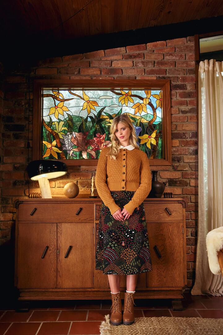 Image of a model wearing Outerwear. Productname: Amelia Cardigan in Olive colour by brand - Princess Highway