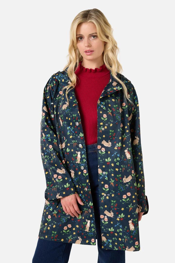 Image of a model wearing Rain Coats. Productname: Lola Rabbit Raincoat in Navy colour by brand - Princess Highway