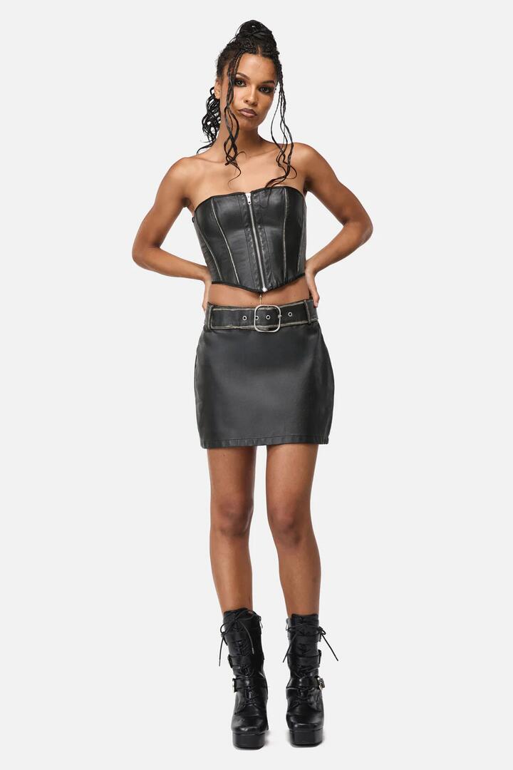 Image of a model wearing Skirts. Productname: Vassal Pu Skort in Black colour by brand - Black Friday