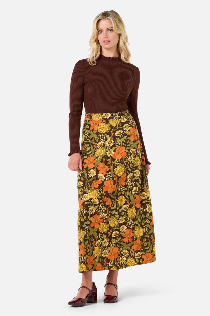 Image of a model wearing Skirts. Productname: Gloria 70'S Floral Midi Skirt in Chocolate colour by brand - Princess Highway