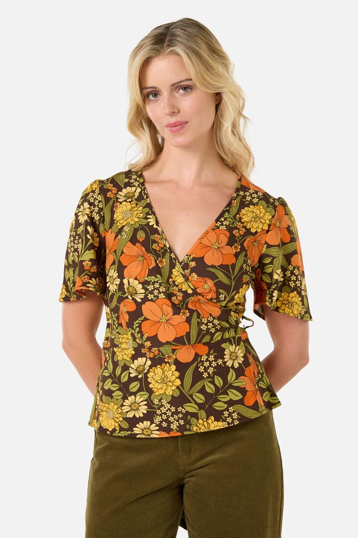 Image of a model wearing Tops. Productname: Gloria 70'S Floral Top in Chocolate colour by brand - Princess Highway