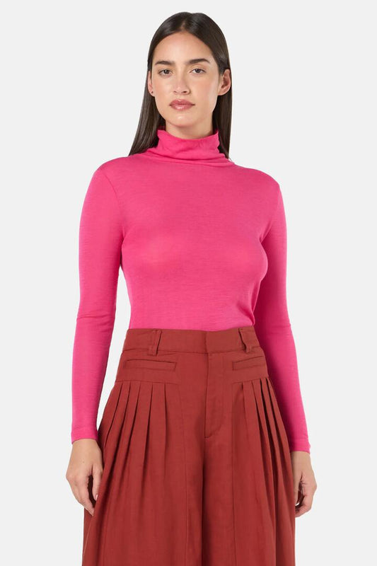 Image of a model wearing Tops. Productname: Merino Polo Top in Green colour by brand - Gorman