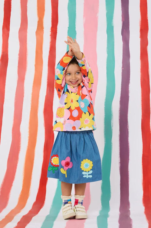 Image of a model wearing Skirts. Productname: Geo Floral Kids Denim Skirt in Denim colour by brand - Gorman