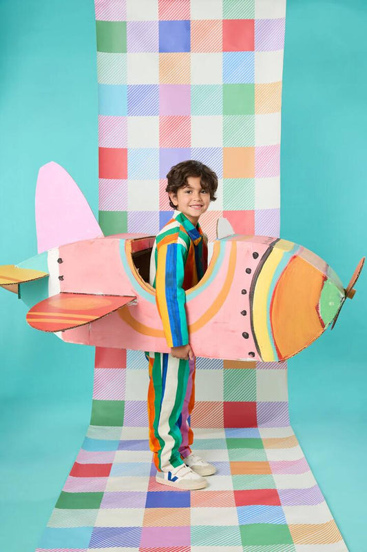 Image of a model wearing Pants. Product name - Painted Stripe Kids Pant in Multi colour by brand - Gorman