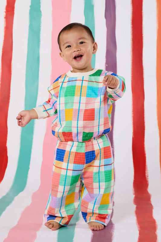 Image of a model wearing Outerwear. Productname: Rainbow Check Baby Sweater in Multi colour by brand - Gorman