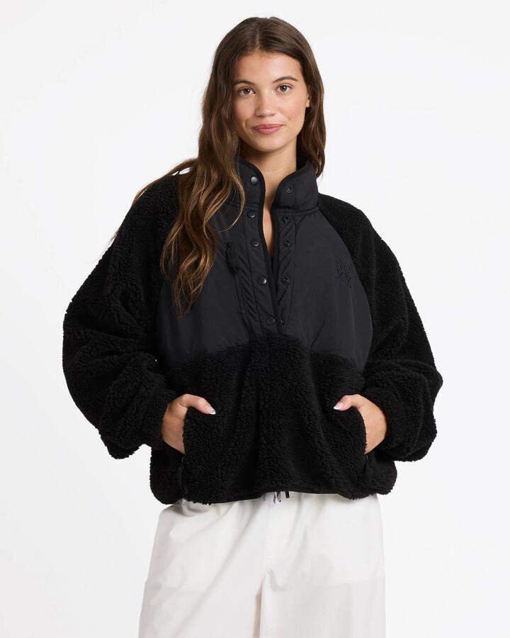Image of a model wearing Outerwear. Productname: Roxy Womens Till Dawn Fleece Pullover Black - in Black colour by brand - Roxy