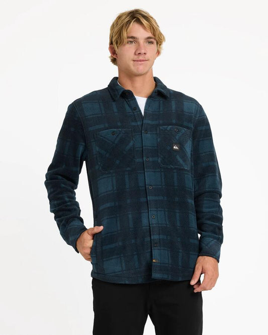 Image of a model wearing Tops. Product name - Quiksilver Mens North Sea Expedition Iii Long Sleeve Shirt Midnight Navy in Midnight Navy colour by brand - Quiksilver