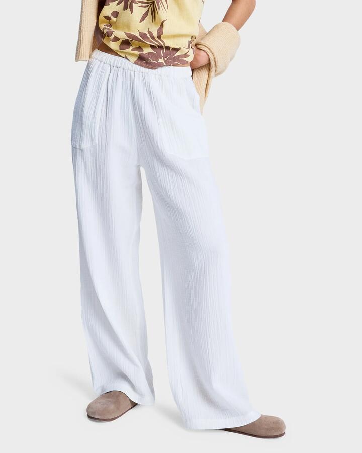 Image of a model wearing Pants. Productname: Roxy Womens What A Vibe Pants Coconut Milk - in Coconut Milk colour by brand - Roxy