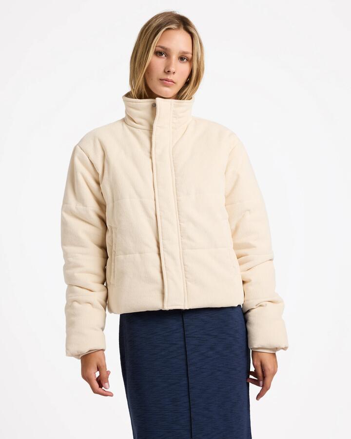 Image of a model wearing Outerwear. Productname: RVCA Womens Eezeh Puffer Jacket Natural - in Natural colour by brand - RVCA