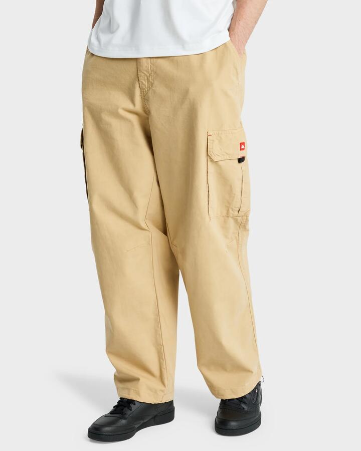 Image of a model wearing Pants. Productname: Quiksilver Mens Yg Thunderstuck Cargo Pants Khaki - in Khaki colour by brand - Quiksilver