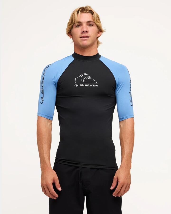 Image of a model wearing Tops. Productname: Quiksilver Mens On Tour Short Sleeve Rash Vest Riviera - in Riviera colour by brand - Quiksilver