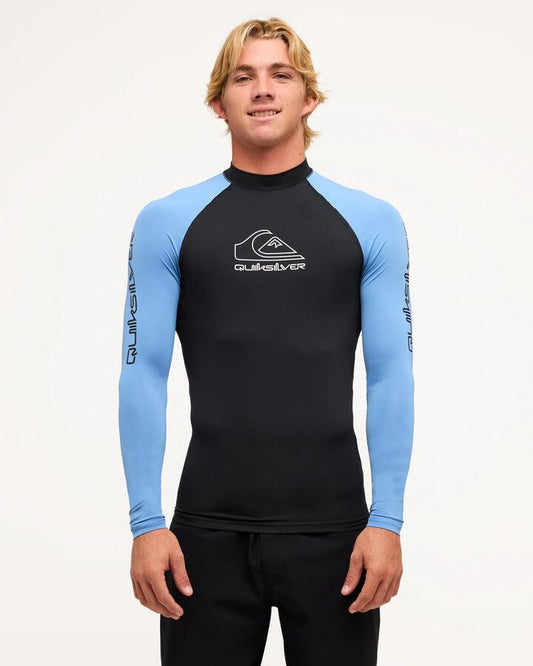 Image of a model wearing Tops. Productname: Quiksilver Mens On Tour Long Sleeve Rash Vest Riviera - in Riviera colour by brand - Quiksilver