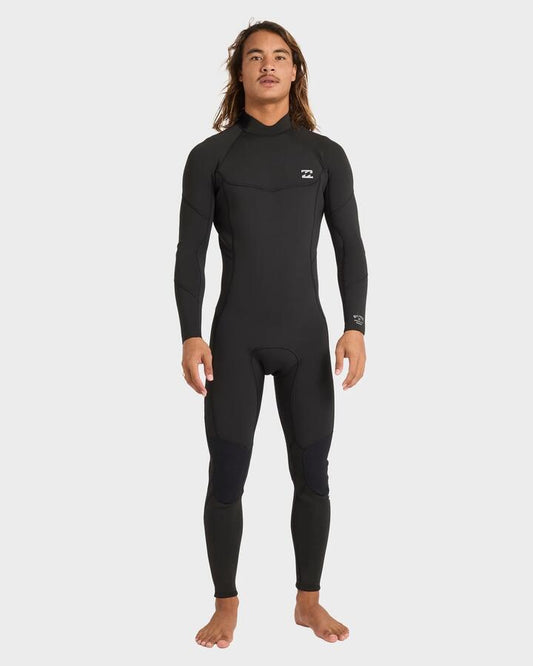 Image of a model wearing Tops. Productname: Billabong Mens 3/2Mm Absolute Back Zip Long Sleeve Fullsuit Black - in Black colour by brand - Billabong