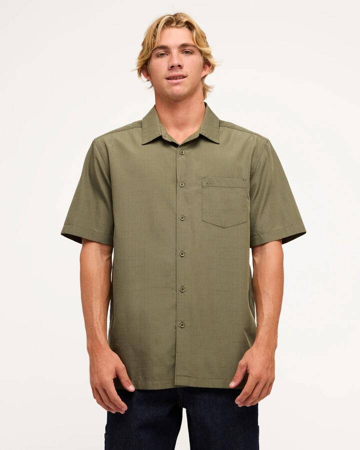 Image of a model wearing Tops. Productname: Quiksilver Mens Centinela Short Sleeve Shirt Olive - in Olive colour by brand - Quiksilver