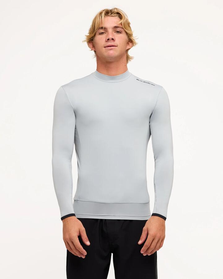 Image of a model wearing Tops. Productname: Quiksilver Mens Highline Long Sleeve Rash Vest Quarry - in Quarry colour by brand - Quiksilver