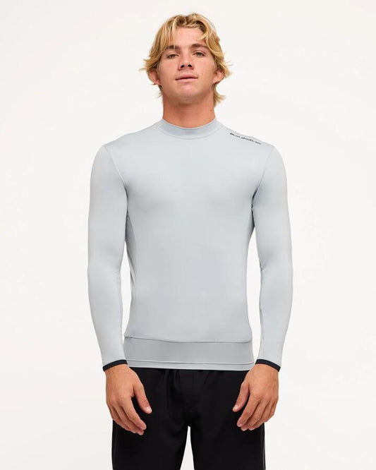 Image of a model wearing Tops. Productname: Quiksilver Mens Highline Long Sleeve Rash Vest Quarry - in Quarry colour by brand - Quiksilver