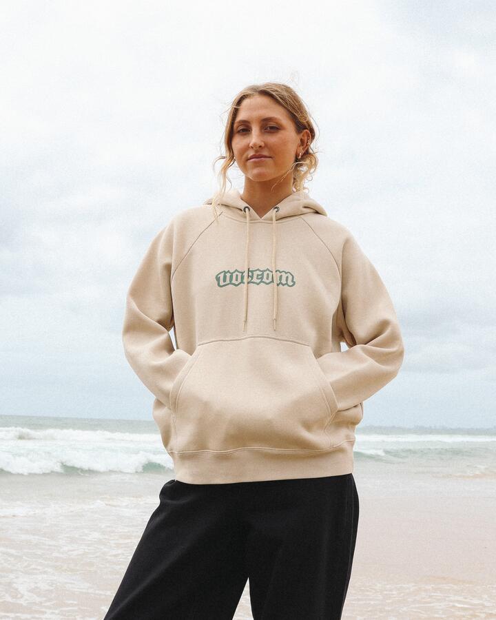Image of a model wearing Outerwear. Product name - Volcom Womens Get More Pullover Hoodie Stone in Stone colour by brand - Volcom