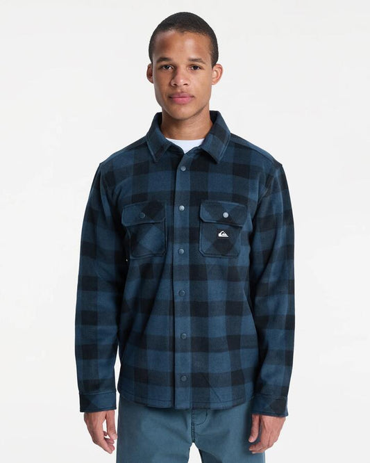 Image of a model wearing Tops. Product name - Quiksilver Mens Bering Strait Check Long Sleeve Shirt Bering Strait Dark Navy in Bering Strait Dark Navy colour by brand - Quiksilver
