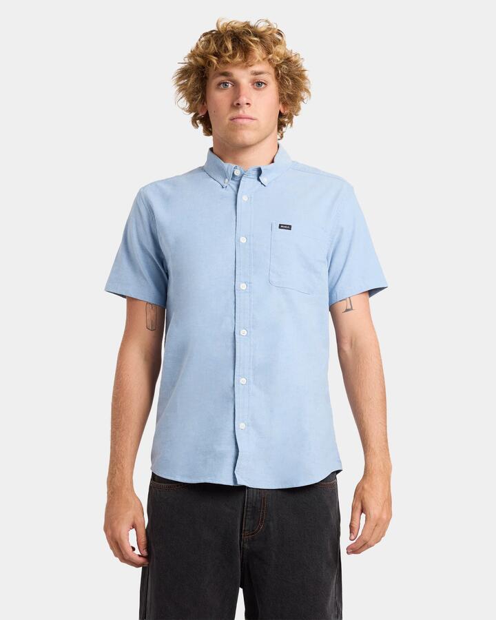Image of a model wearing Tops. Productname: RVCA Mens Thatll Do Stretch Short Sleeve Shirt Oxford Blue - in Oxford Blue colour by brand - RVCA