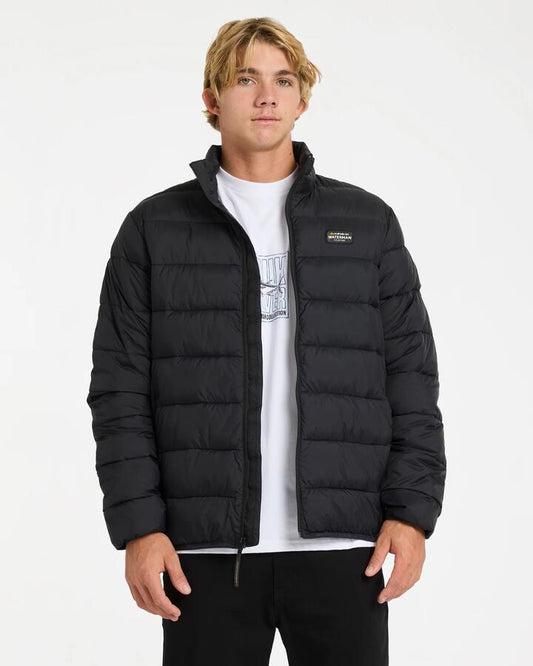 Image of a model wearing Outerwear. Product name - Quiksilver Mens First Light Puffer Jacket Black in Black colour by brand - Quiksilver