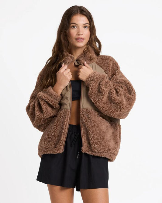 Image of a model wearing Outerwear. Product name - Roxy Womens At Dusk Fleece Jacket Mocha in Mocha colour by brand - Roxy