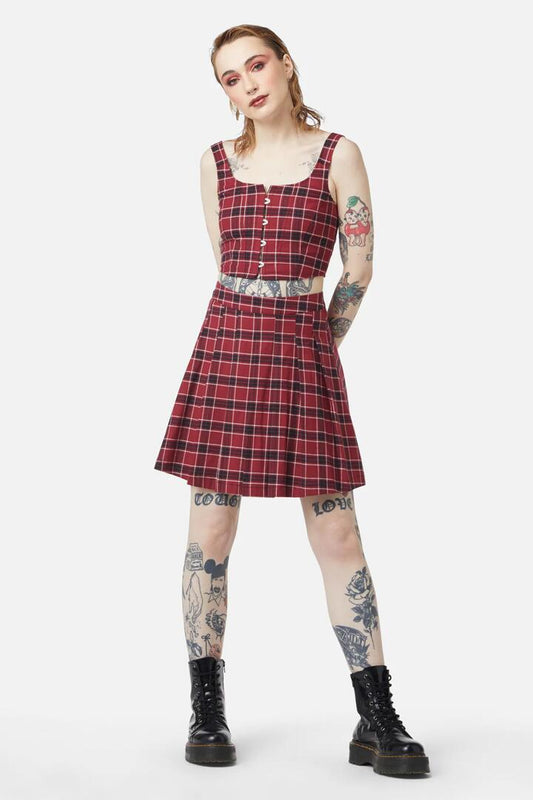 Image of a model wearing Skirts. Productname: Revenge Tartan Pleated Skirt in Maroon colour by brand - Dangerfield