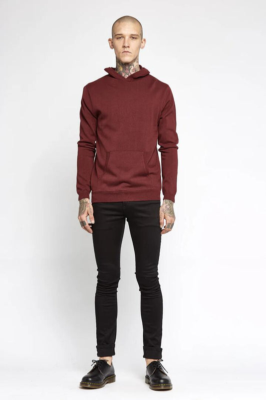 Image of a model wearing Outerwear. Productname: Knitted Hoodie in Burgundy colour by brand - Revival