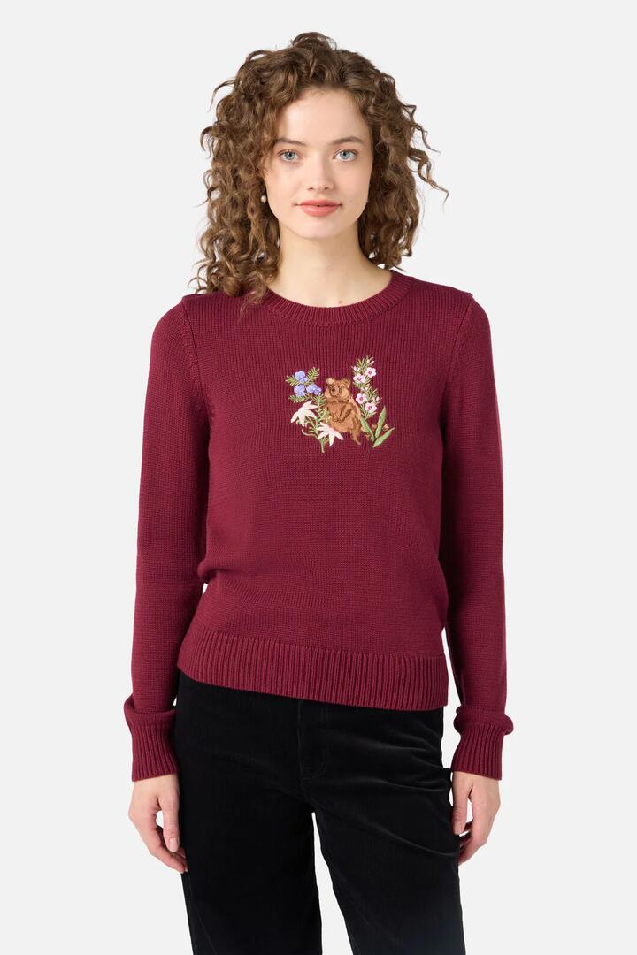Image of a model wearing Outerwear. Productname: Quokka Embroidered Jumper in Rose colour by brand - Princess Highway