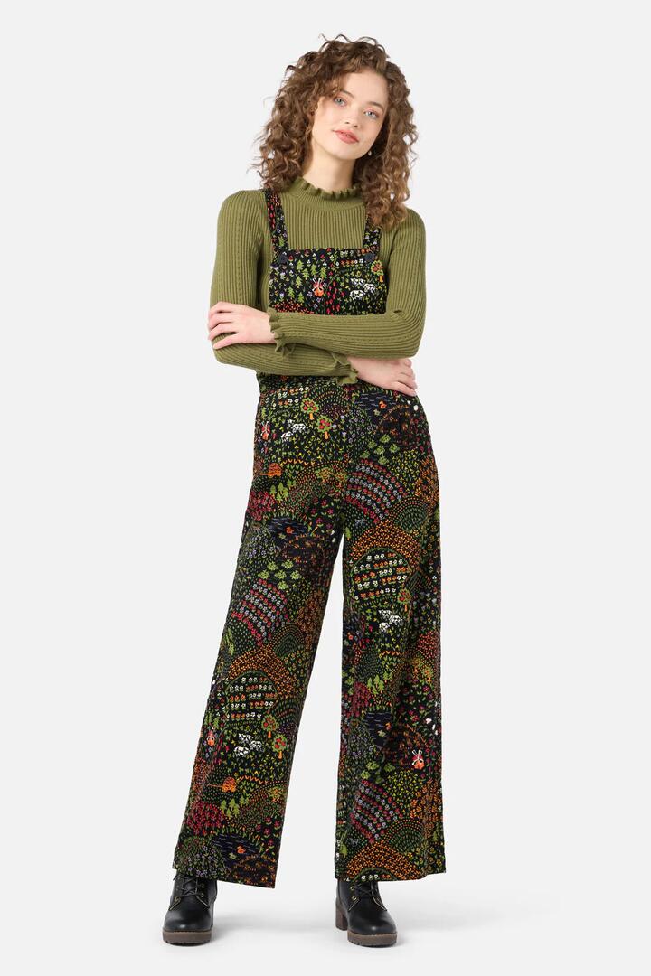 Image of a model wearing Pants. Productname: Rolling Hills Cord Overall in Black colour by brand - Princess Highway