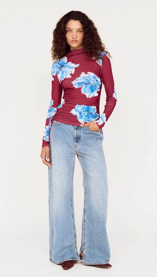 Image of a model wearing Tops. Product name - Blue Floral Mesh Long Sleeve Top in Wine/Blue Floral colour by brand - MINKPINK