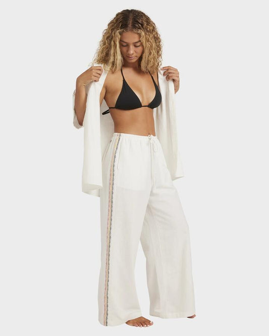 Image of a model wearing Pants. Product name - Billabong Womens Otis Dreaming Elastic Waist Pants Salt Crystal in Salt Crystal colour by brand - Billabong
