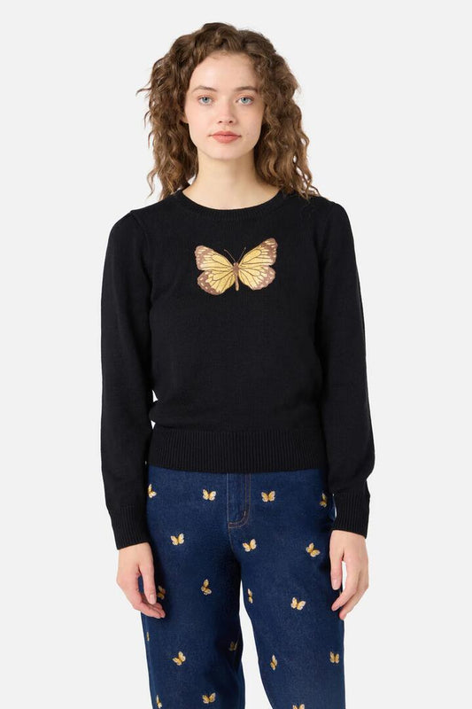 Image of a model wearing Outerwear. Productname: Butterfly Embroidered Jumper in Black colour by brand - Princess Highway
